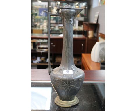 WMF Art Nouveau Pewter Wine Ewer stamped to base floral decorated. 41cm in Height 