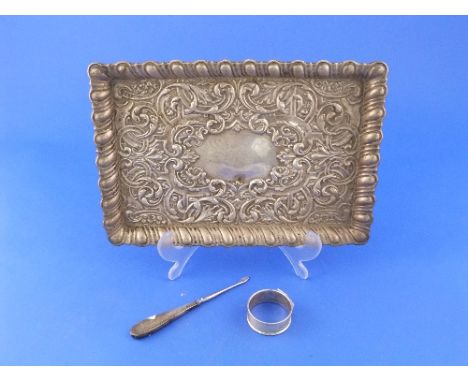 An Edwardian silver Dressing Table Tray, by Sydney & Co., hallmarked Birmingham, 1905, of rectangular form with scrolling fol