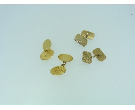 A pair of 9ct yellow gold oval Cufflink's, the fronts with engine turned decoration, the reverse plain with chain between, to