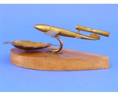 A W.W.2 period brass trench art  Lighter formed in the model of a V-1 Flying Bomb (also known as a buzz-bomb or doodlebug), m