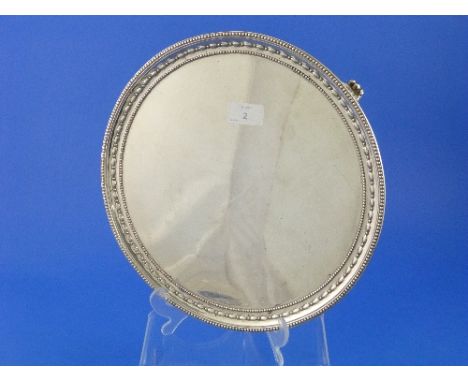 A Victorian silver Salver, by John Hunt & Robert Roskell, of circular form with beaded rim, raised on four cast feet, the rev