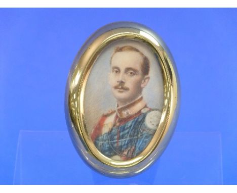 A portrait miniature of a gentleman in Black Watch, oval, on ivory, the backing paper signed in pencil "A. M. Wright artist 1