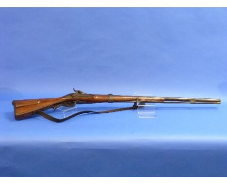 A 19thC provincial percussion Sporting Gun, with 33½in (85cm) barrel, a sliding wooden patch box and scrolled trigger guard, 
