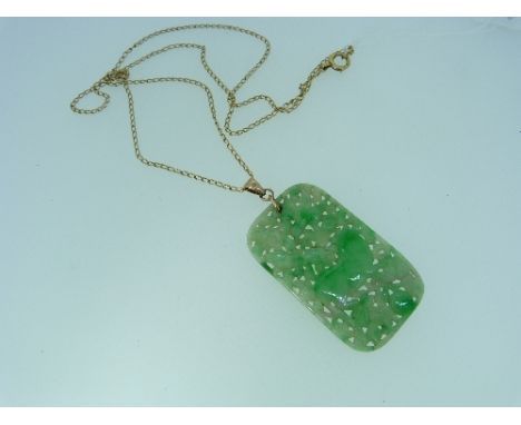 A reversible pierced carved Jade Pendant, of rectangular form, carved with a beast amongst birds and insects, with rose colou
