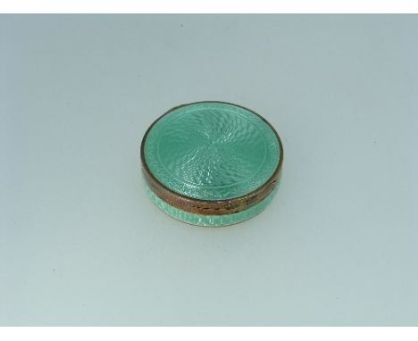 A Continental silver and enamel Powder Compact, import marked for London, 1924, of small circular form, the side and hinged l