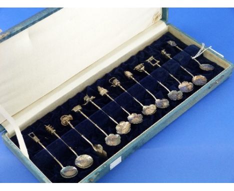 A cased set of Oriental sterling silver novelty Spoons, with six pairs of cut leaf shaped bowls, 'bamboo' handles and each te