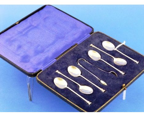 A cased set of six George V silver Teaspoons / Sugarnips, by George Howson, hallmarked Sheffield, 1934 / 1935, in fitted, vel