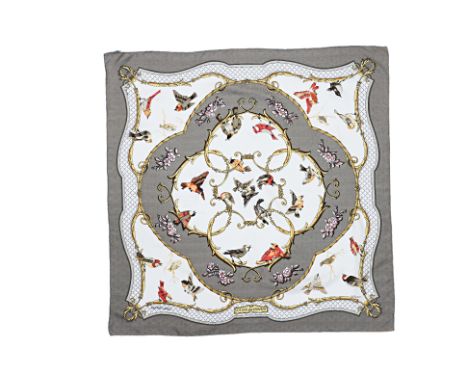 AN HERMÈS LA CLÉ DES CHAMPS SILK SCARF
Designed by Françoise Faconnet. Featuring Grey and white with birds and flowers.
HERMÈ