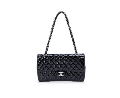 A CHANEL "SECRET LABEL" PATENT LEATHER FLAP BAG Patent leather exterior with a 'Chanel' label on the bottom of the bag, inclu