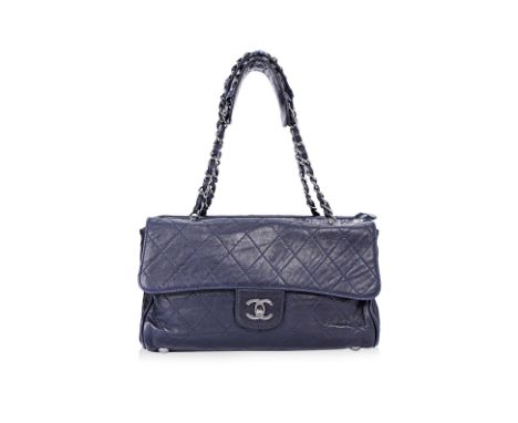A CHANEL BLUE RITZ FLAP BAG Blue calfskin leather exterior with silver-tone hardware, chain-link shoulder straps, twill linin