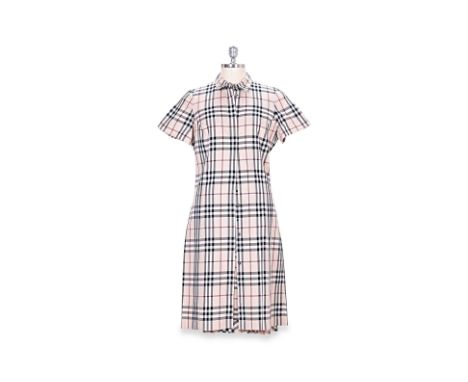 A BURBERRY TARTAN DRESS AND MATCHING SKIRT
Tartan button down dress, skirt with ruffle hem and slit in back.
BURBERRY
UK 10
C