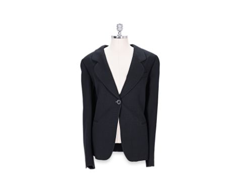 A GIORGIO ARMANI BLAZER
Lined, single button on front and sleeves, welt pockets, new with tags.
GIOGIO ARMANI
US 50
Condition
