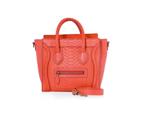 A CELINE ORANGE PYTHON MINI LUGAGE TOTE Orange python leather exterior, includes detachable strap and brand dust bag. CELINE 