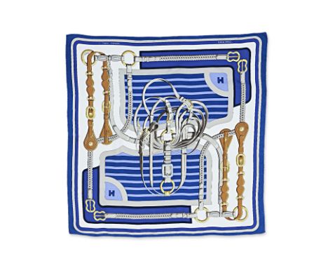 AN HERMÈS "COACHING" SILK SCARF
Designed by Julia Abadie. Featuring harnessed on blue accent background.
HERMÈS
90cm x 90cm
C