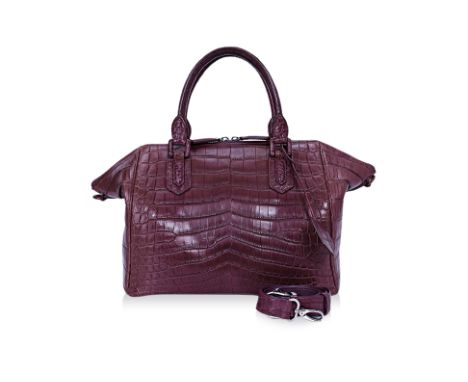 AN ETHAN K BURGUNDY SATCHEL HANDBAG
Ethan 11 with orange leather interior, detachable straps, small metal mirror, and dust ba