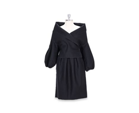 A PRADA SKIRT AND JACKET WOOL SET Cropped wool jacket with elastic cinched sleeves, button closure, skirt has pockets and fea