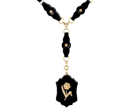 Victorian Carved Black Onyx, 14 Karat Yellow Gold and Seed Pearl Pendant Necklace. Stamped 14K to clasp. Very good antique co
