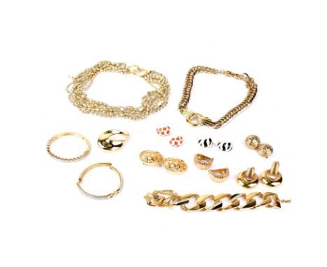 Collection of Vintage Gold Tone Signed Designer Costume Jewelry by Givenchy, Christian Dior and Kenneth Jay Lane. The collect