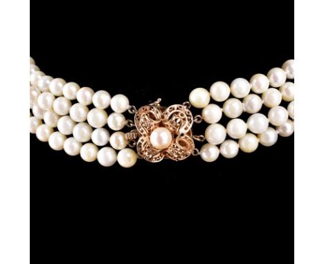 Vintage Four Strand 8mm White Pearl and 14 Karat Yellow Gold Necklace. Stamped 14K to clasp, Pearls with good polish and lust