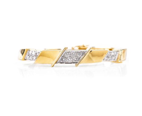 Vintage Signed Cartier Pave Set Round Brilliant Cut Diamond and 18 Karat Yellow Gold Hinged Bangle Bracelet. Signed, stamped 