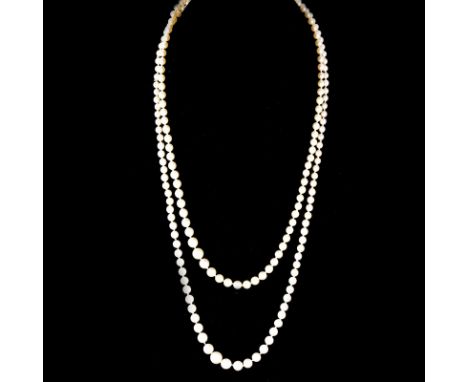 Antique Single Strand One Hundred Ninety Seven (197) Graduated White Pearl Necklace with 14 Karat White Gold Clasp. Pearls wi