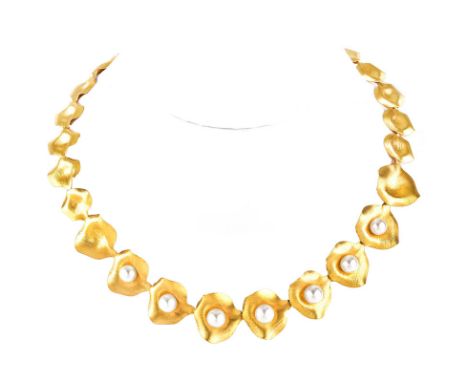 Vintage Italian 18 Karat Yellow Gold and Seven (7) White Pearl Necklace. Stamped Italy 18K. Pearls measure 8mm each. Very goo
