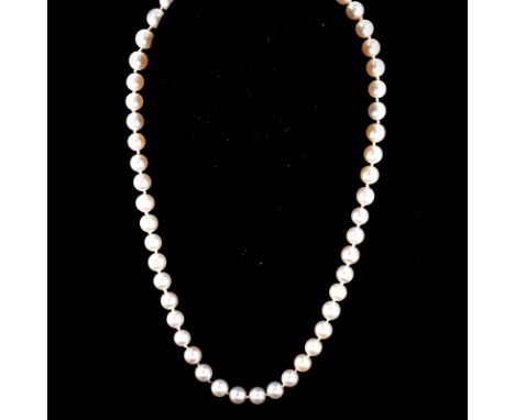 Vintage Single Strand Pearl Necklace with Gold Filled Clasp. Pearls measure 7mm each. Unsigned. Good condition. Measures 17-1