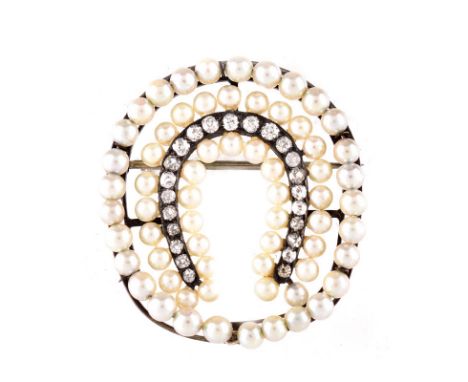 Antique Pearl, Diamond and 14 Karat White Gold Horse Shoe Brooch. Unsigned. Pearls measure 3mm. Very good condition. Measures
