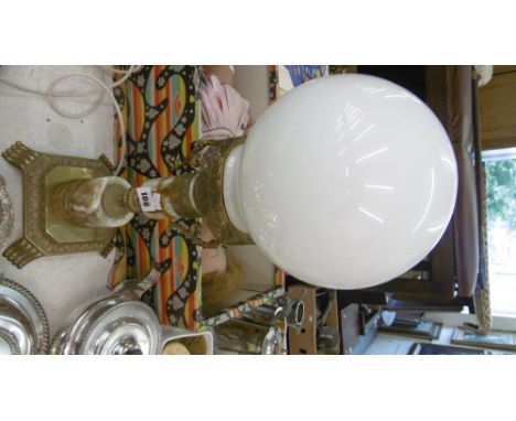 A BRASS AND ONYX TABLE LAMP