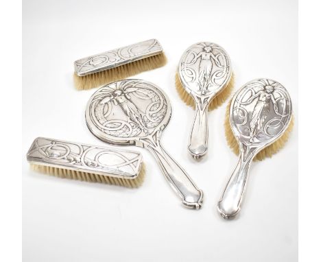 A collection of early 20th Century Art Nouveau silver hallmarked dressing table items. Each being decorated with repousse det