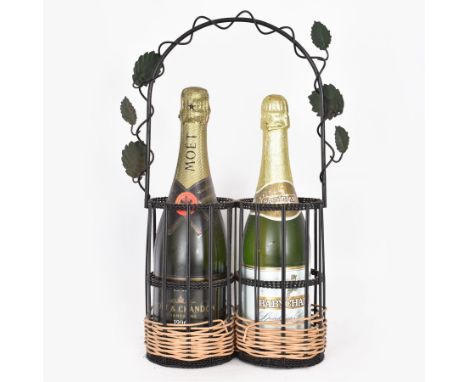 Moet & Chandon 1996 champagne, together with Babycham sparkling perry, in a wine holder, various contents and proof 