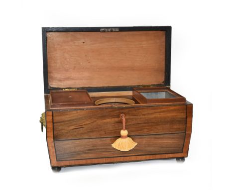 Georgian sarcophogus shaped tea caddy, with inlaid panels and twin lion mask handles, with mahogany compartmentalised interio