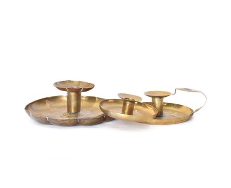 Three Arts & Crafts brass chambersticks/candlesticks, to include a small Keswick School of Industrial Arts example, with repo