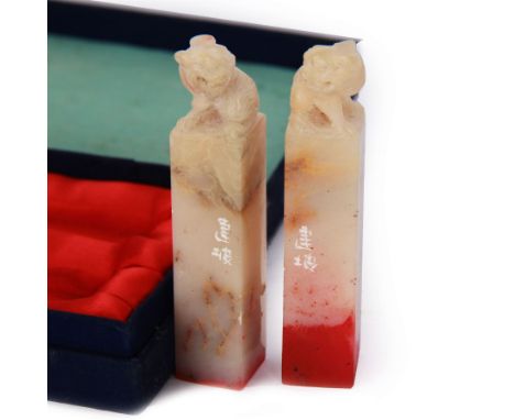 Pair of Chinese carved soapstone seals with temple dog finials, boxed, seal H8cm