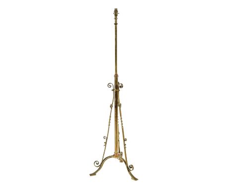 An Edwardian brass telescopic oil lamp, on tripod, adapted for electricity, 149cm h  Complete