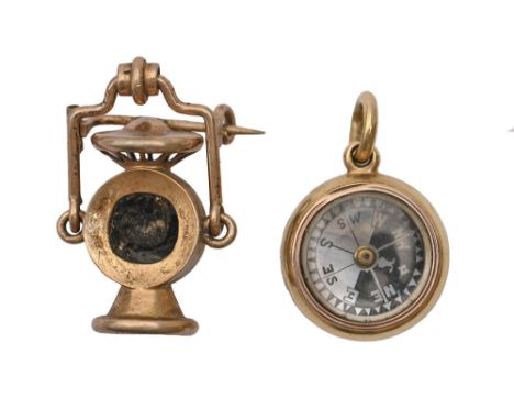 Gold compass charm and miners lamp  