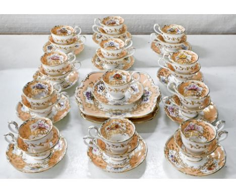 A Coalport tea and coffee service, c1840, painted with a central rose and panels of flowers reserved on the salmon pink borde