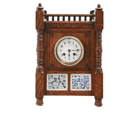 An Aesthetic Movement oak and blue and white tile-inset mantel clock, J W Benson, 25 Old Bond Street, London, c1880, with gal