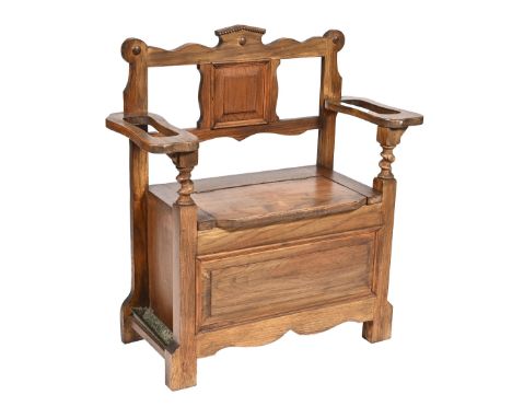 A stained wood settle and stick stand, early 20th c,&nbsp;88cm h; 82 x 36cm  Good condition