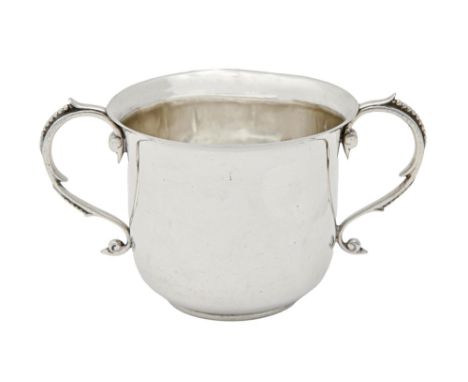 An Edwardian silver porringer, with beaded handles, 90mm h, by D &amp; J Wellby Ltd, London 1901, 7ozs 8dwts  Base of one han