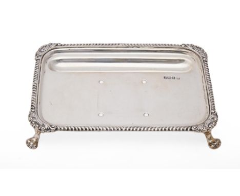 A George V silver inkstand, with gadrooned rim, 17cm l, by James Deakin &amp; Sons, Sheffield 1910, 7ozs 11dwts  Light polish