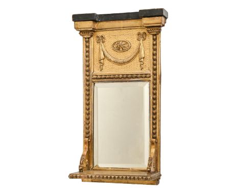 A Victorian giltwood and composition mirror, with shelf and bevelled plate, 55 x 26cm  Minor losses and wear to gilding, glas