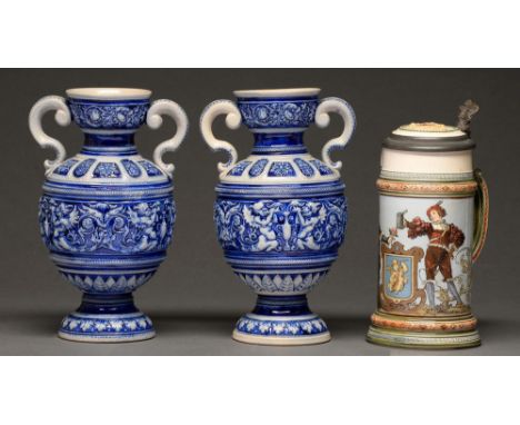 A German pewter mounted Mettlach stein and a pair of German saltglazed grey stoneware two handled vases, c1900, a&nbsp;Carlto