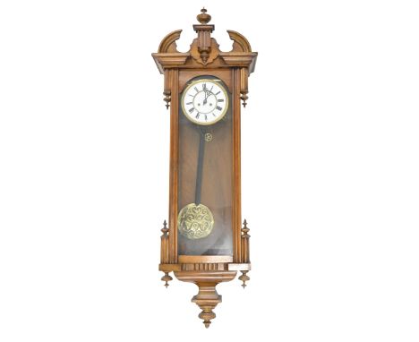 A Victorian mahogany fretwork framed mirror, 92 x 49cm and an early 20th c Vienna wall clock, with giltmetal mounted enamel d