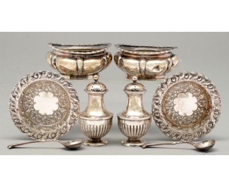 A pair of Victorian silver vase shaped pepperettes, crested, 62mm h, by Henry Matthews, Birmingham 1894 and two pairs of cont