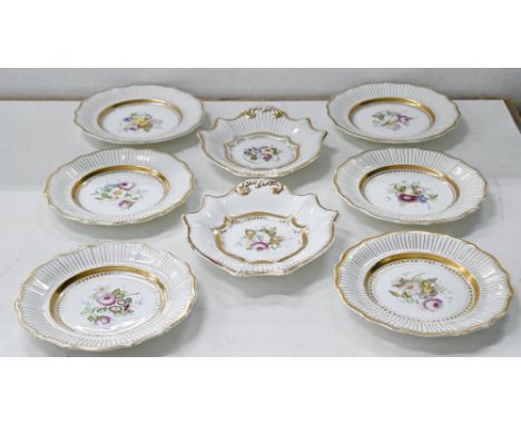 A Staffordshire bone china dessert service, possibly Samuel Alcock, c1825, painted with flowers in gilt striped border, plate