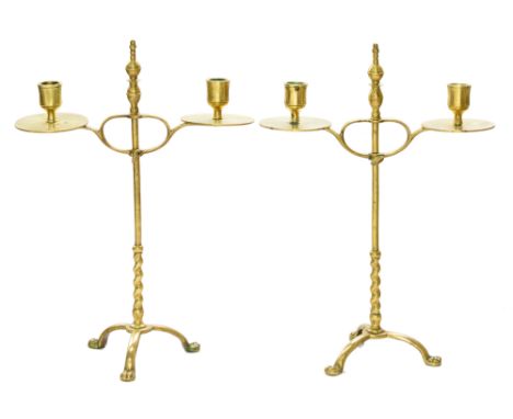 A pair of English brass adjustable candelabra, c1900,&nbsp; on domed tripod, 38cm h