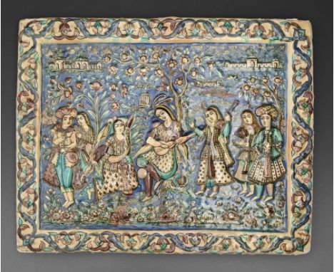 A Qajar style relief moulded tile, 20th c, of a group of musicians and other figures before a blossoming tree, 40 x 51cm  Bro