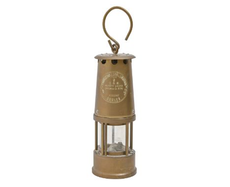 A brass miner's safety lamp  