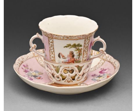 A German porcelain two handled cup and trembleuse stand, c1900, painted with 18th c lovers alternating with pink ground flora